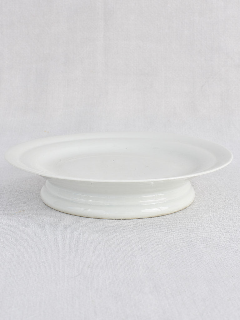 Antique French footed plate 9"
