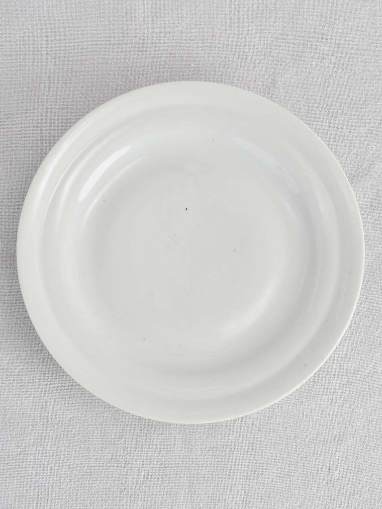 Antique French footed plate 9"