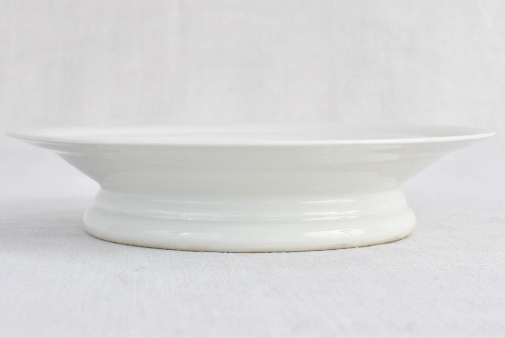 Antique French footed plate 9"