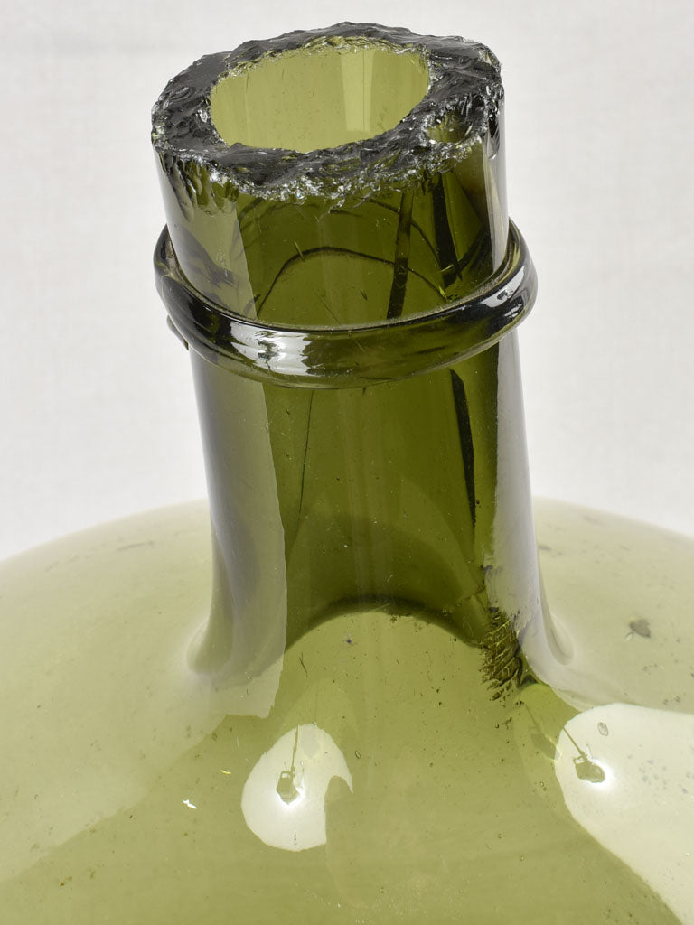 Decorative early-century demijohn bottle