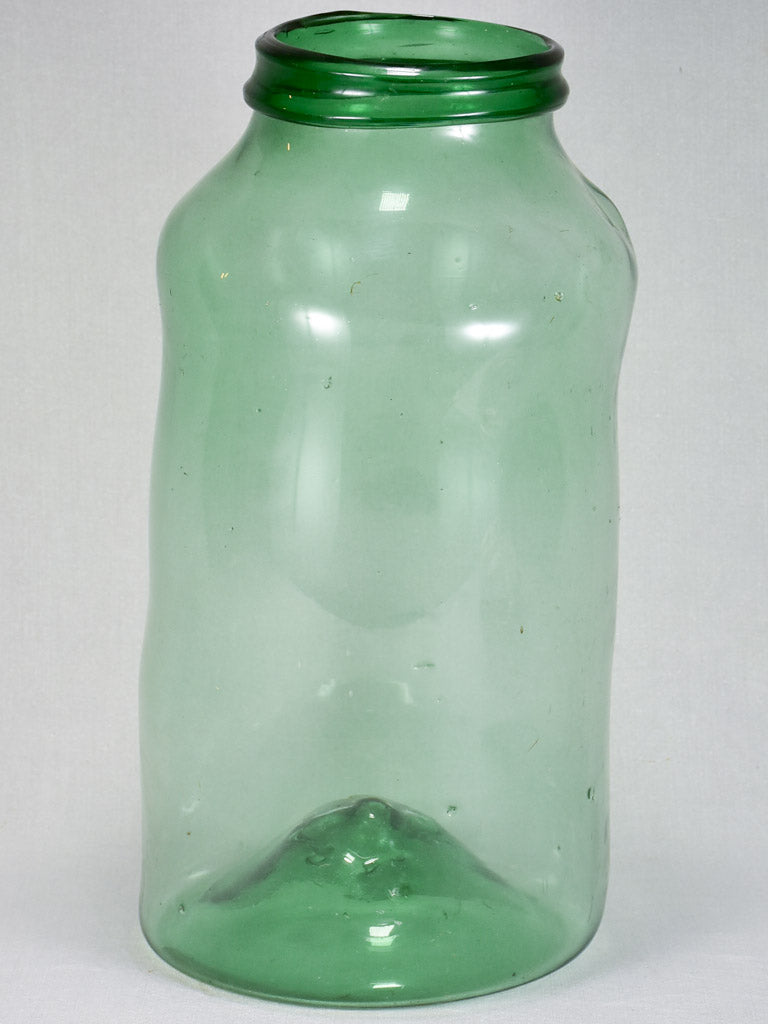 Leaning early 19th-century blown glass preserving jar 20¾"