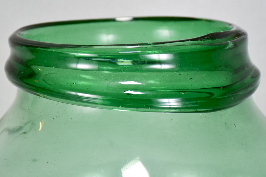 Leaning early 19th-century blown glass preserving jar 20¾"