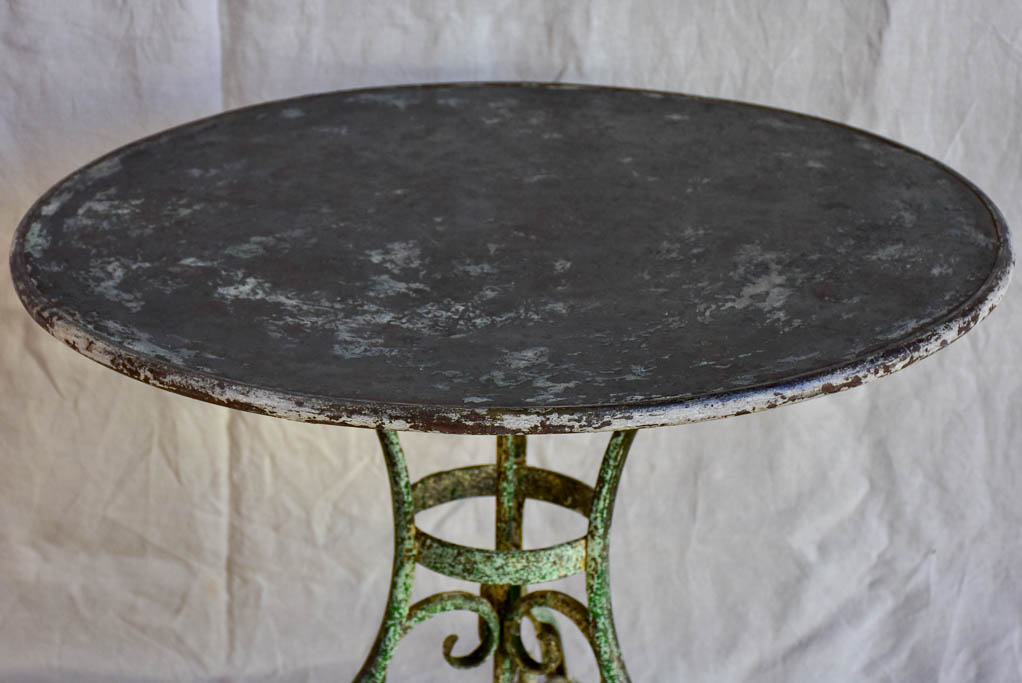 Late 19th Century round Arras garden table with claw feet 32"