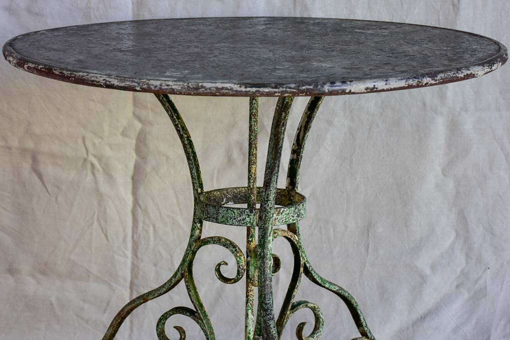 Late 19th Century round Arras garden table with claw feet 32"