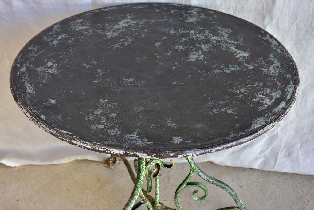 Late 19th Century round Arras garden table with claw feet 32"