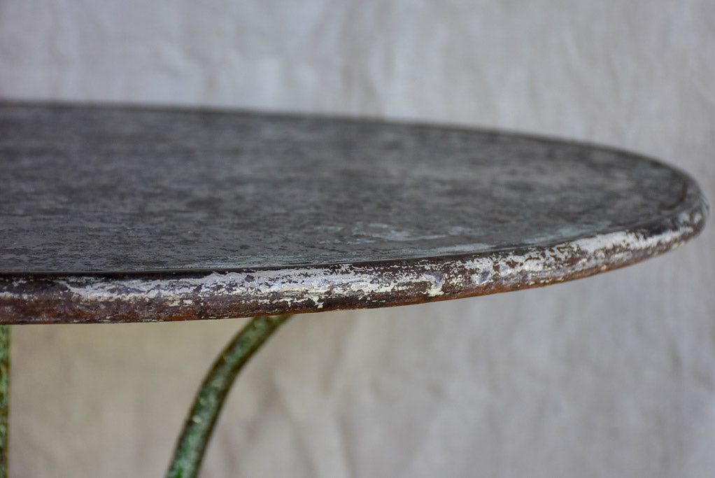 Late 19th Century round Arras garden table with claw feet 32"