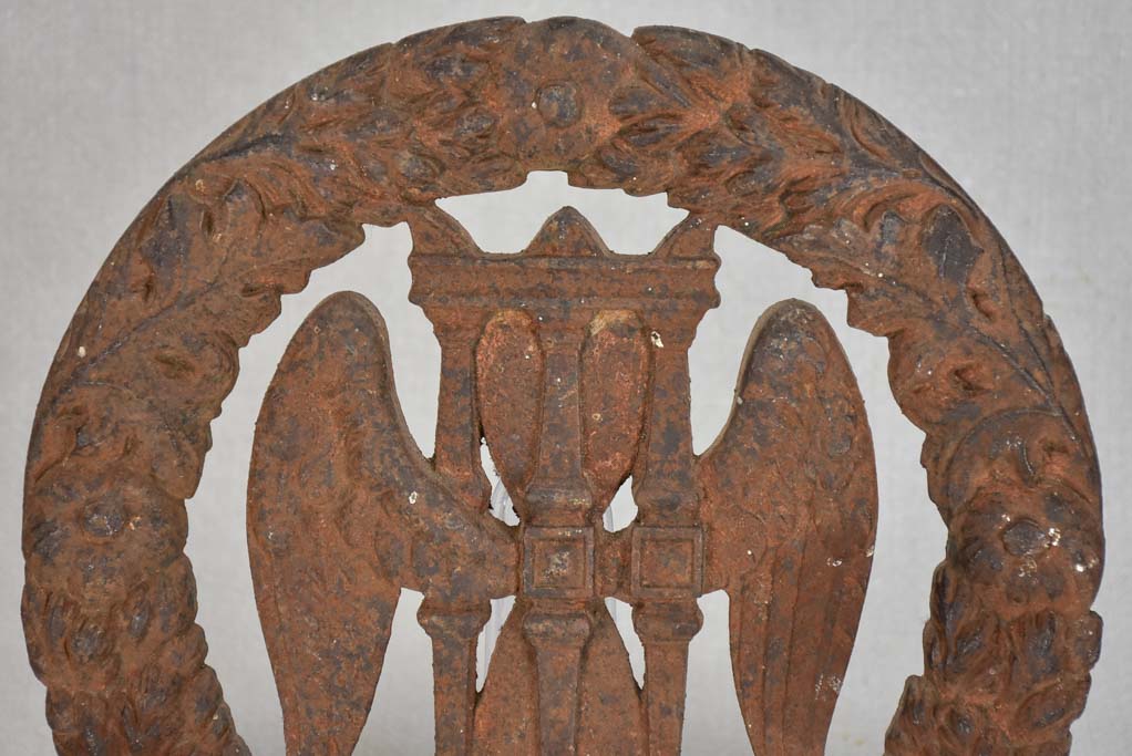 Late 19th-century cast iron eternity wreath with hourglass and wings 10¼"