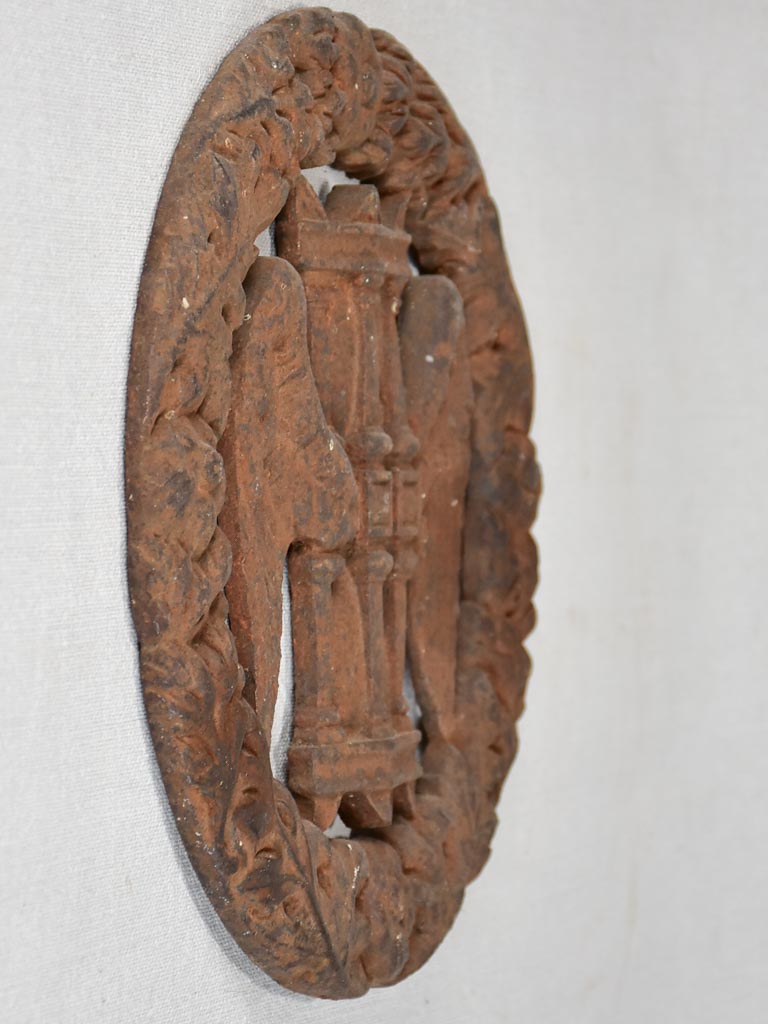Late 19th-century cast iron eternity wreath with hourglass and wings 10¼"