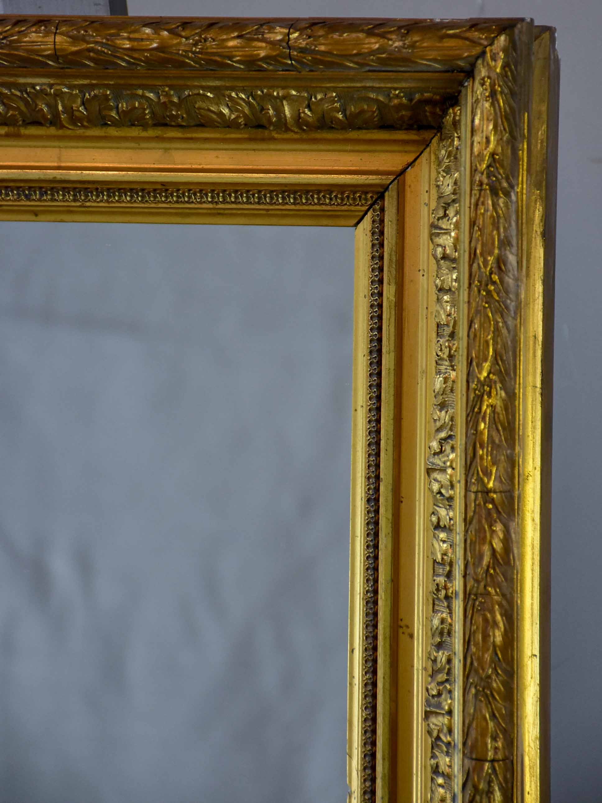 Late 19th Century rectangular mirror with gilded frame
