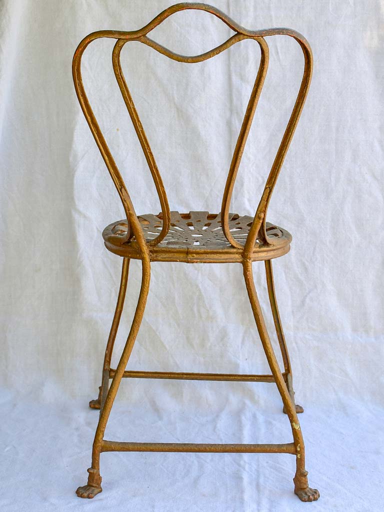 19th century French iron garden chair from Arras with lions claw feet