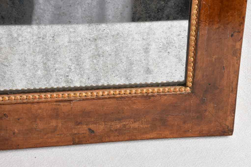 PAIR OF 19TH CENTURY ITALIAN GILT WOOD MIRRORS WITH MASQUERADE PEDIMENT 39½" x 19¾"