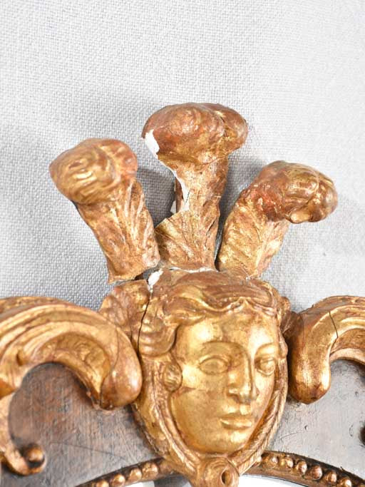 PAIR OF 19TH CENTURY ITALIAN GILT WOOD MIRRORS WITH MASQUERADE PEDIMENT 39½" x 19¾"