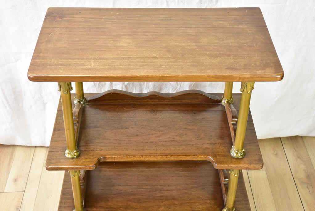 Early twentieth century shelving unit with bronze frame from a boutique 32¼"