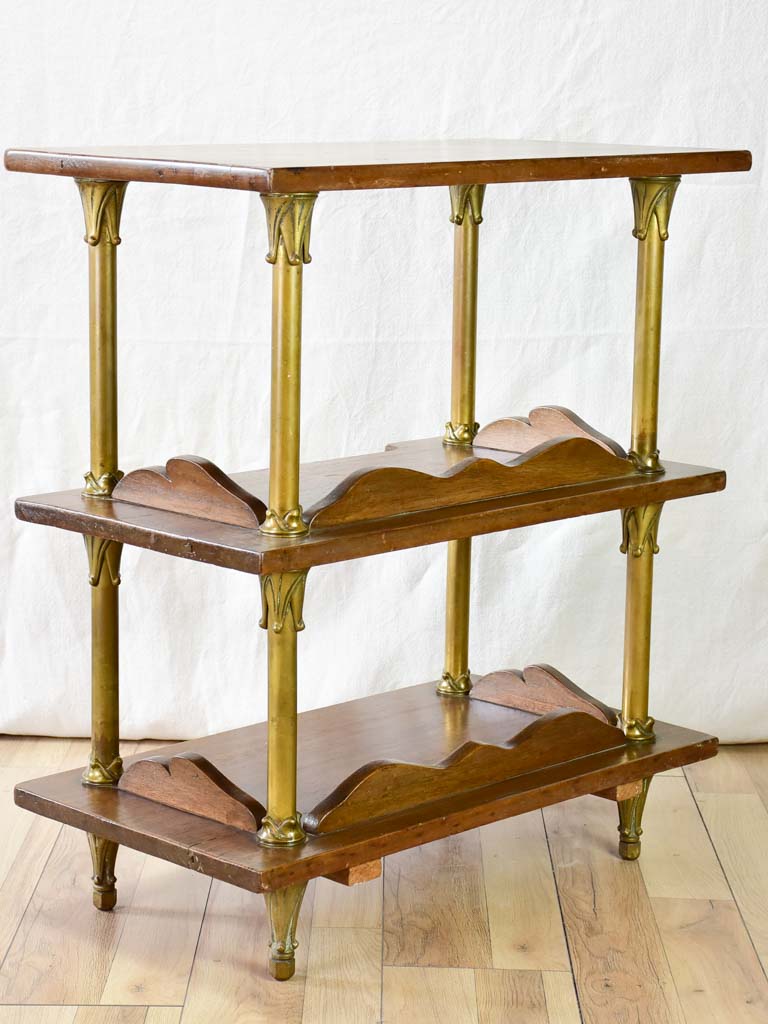 Early twentieth century shelving unit with bronze frame from a boutique 32¼"