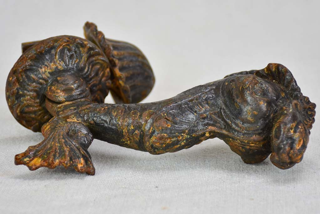 Antique cast iron door knocker dolphin and shell motif