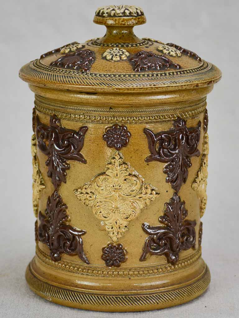 Small antique French sandstone tobacco pot with lid and decorative motifs