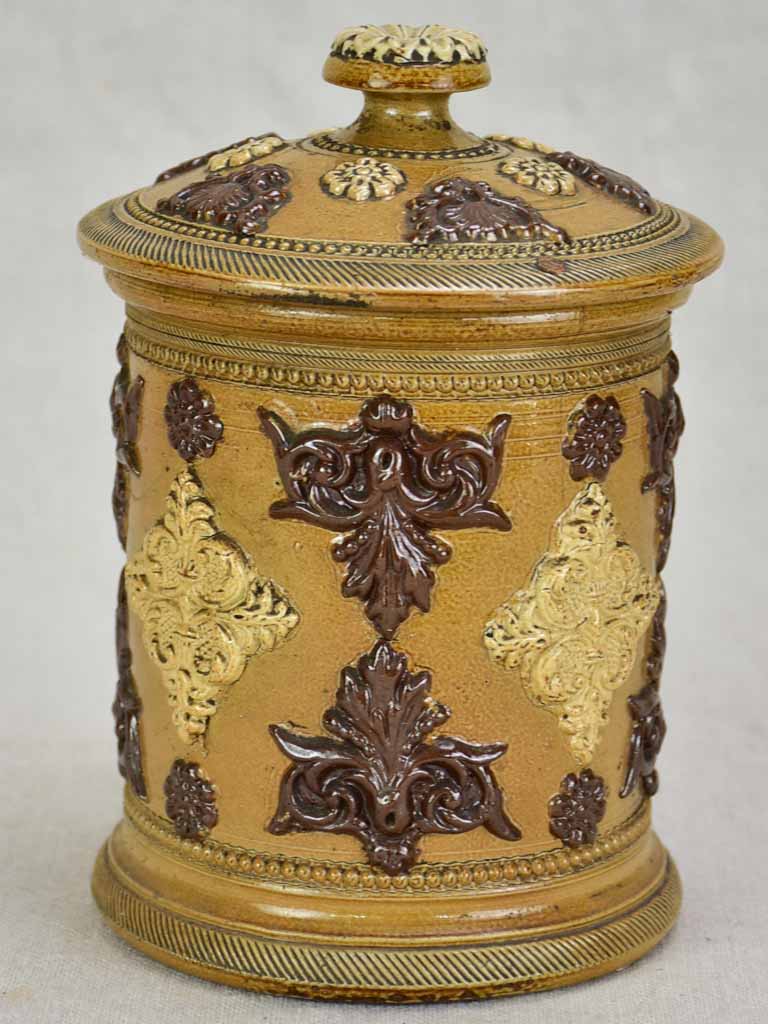 Small antique French sandstone tobacco pot with lid and decorative motifs