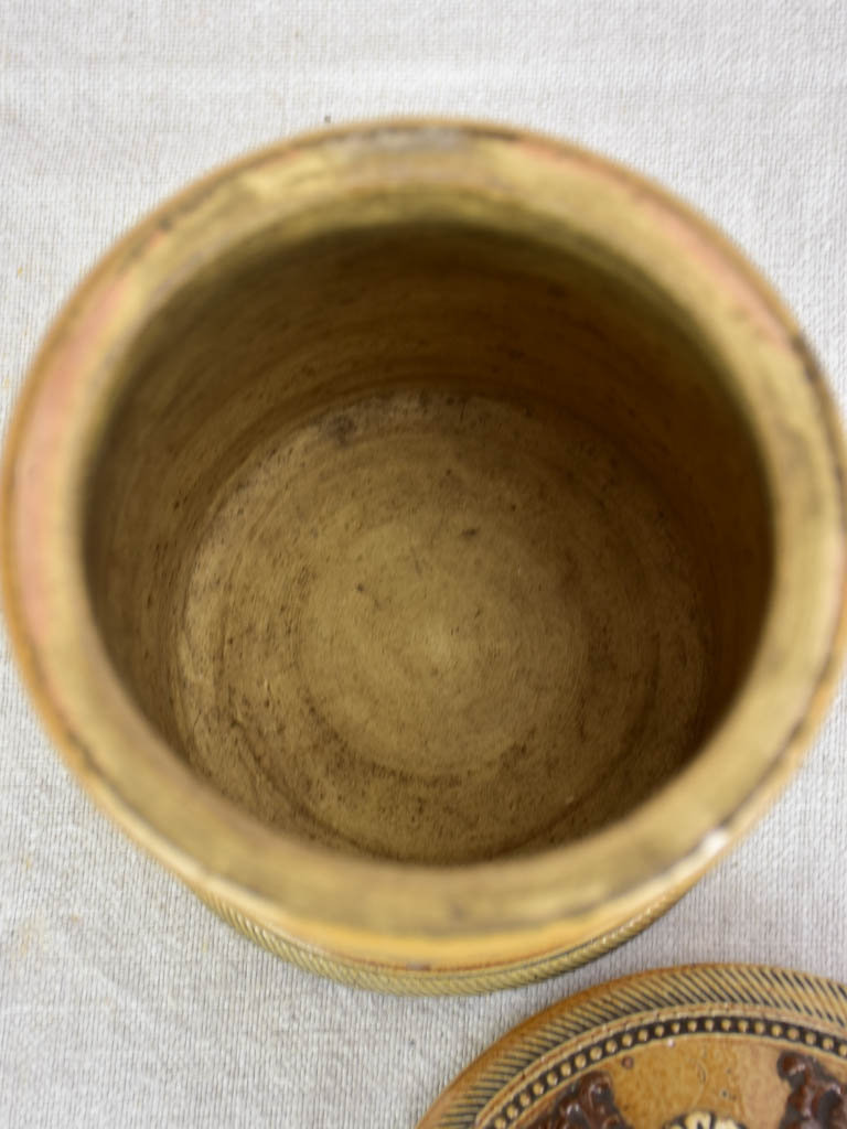 Small antique French sandstone tobacco pot with lid and decorative motifs