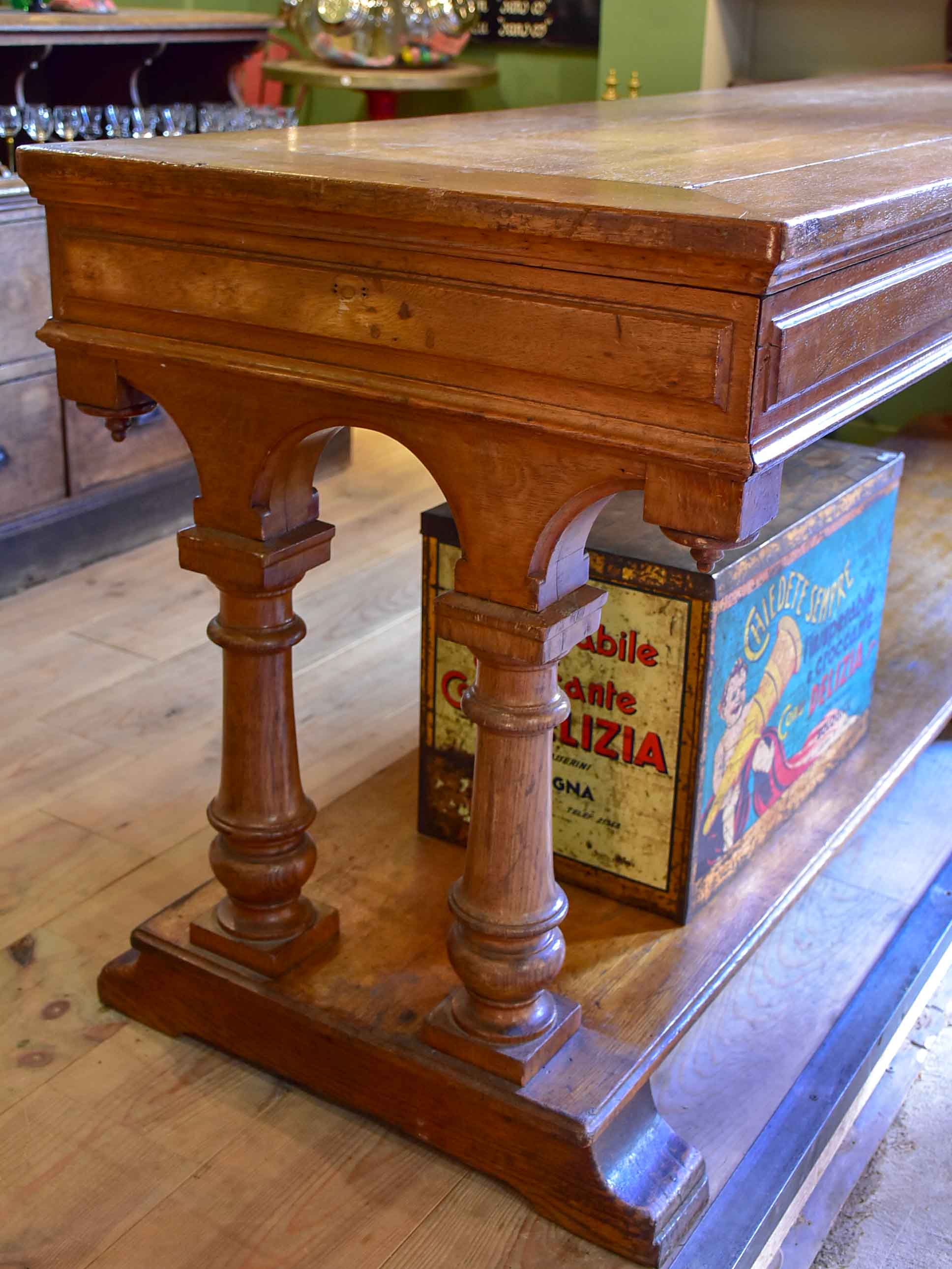 Antique French oak drapery table from a silk boutique