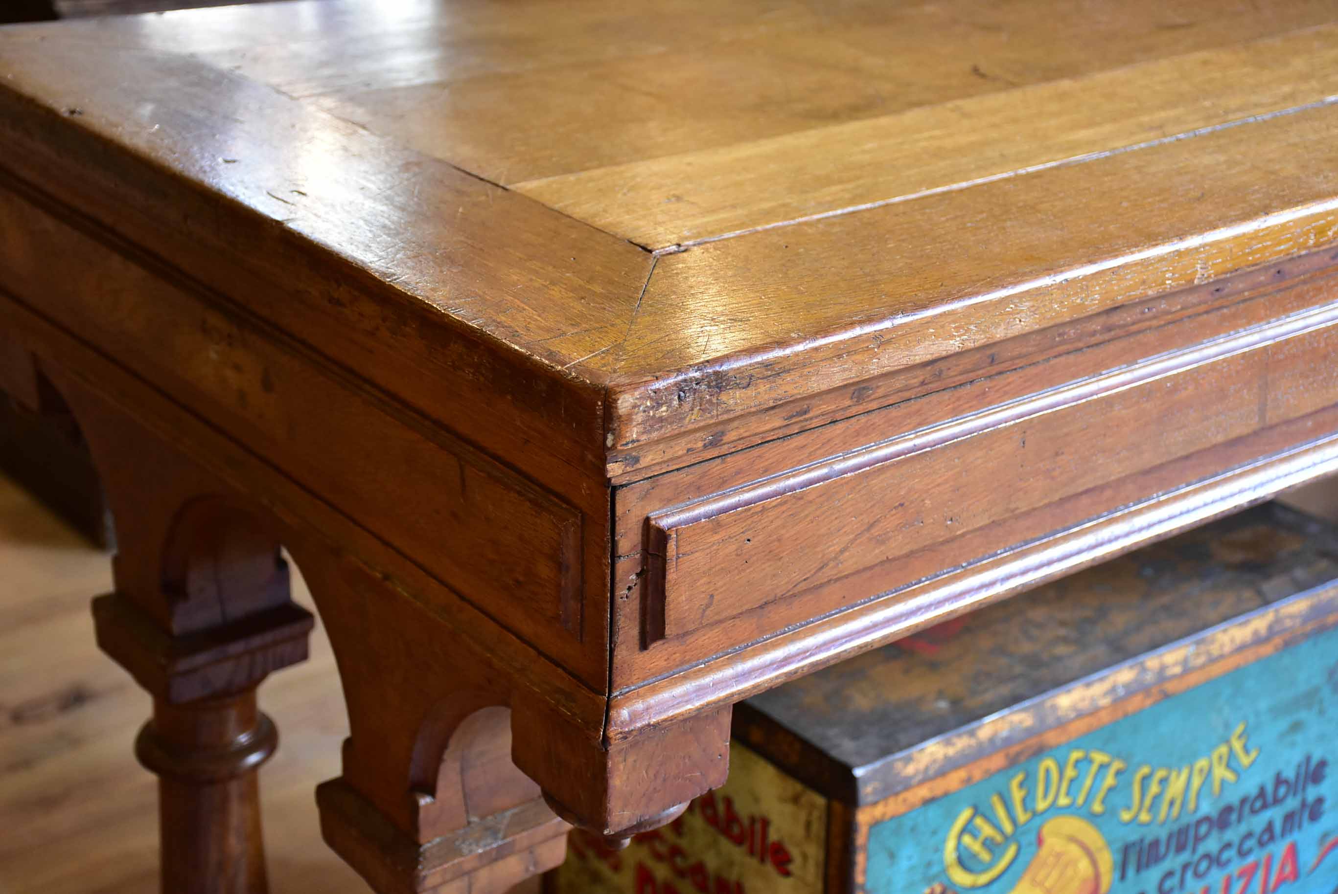 Antique French oak drapery table from a silk boutique