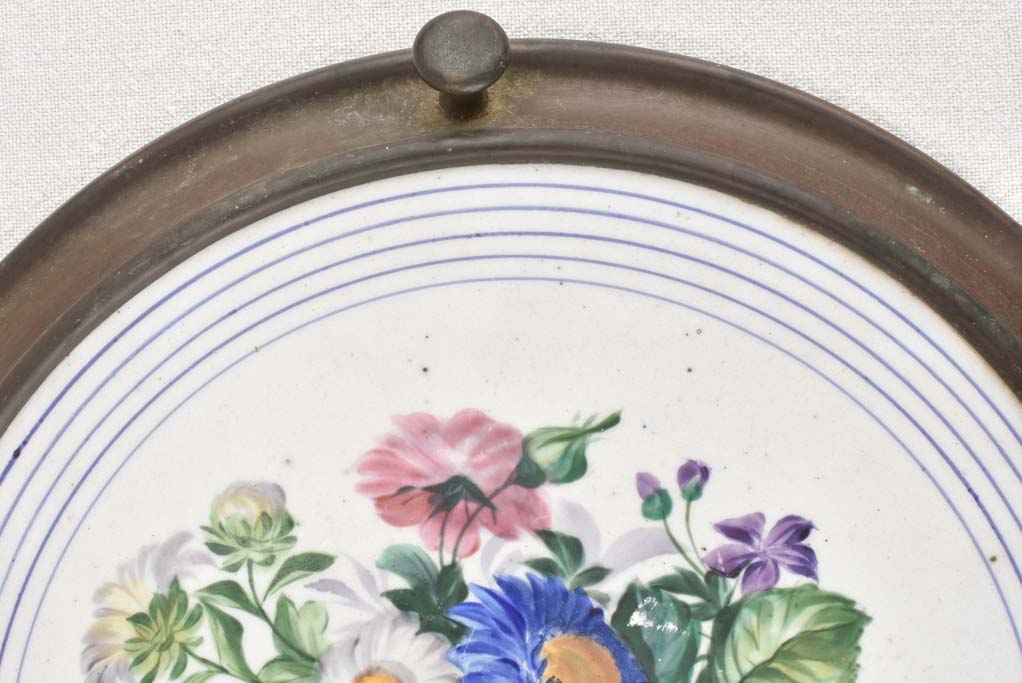 Traditional brass and ceramic trivet