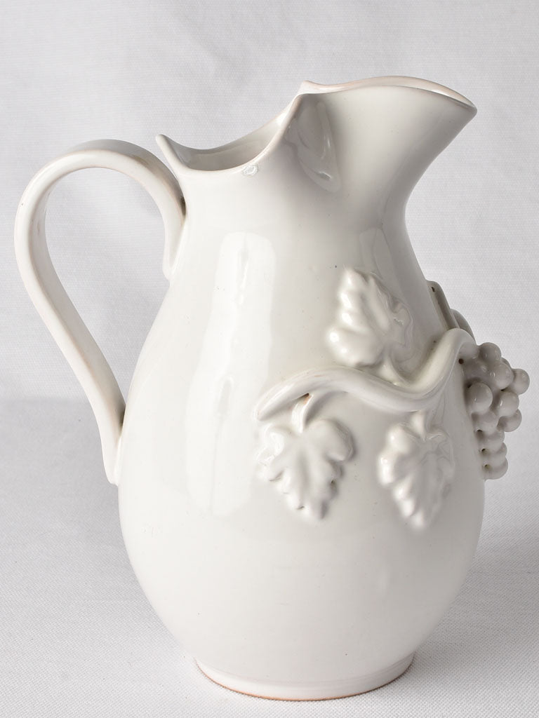 White Emile Tessier pitcher with grapes