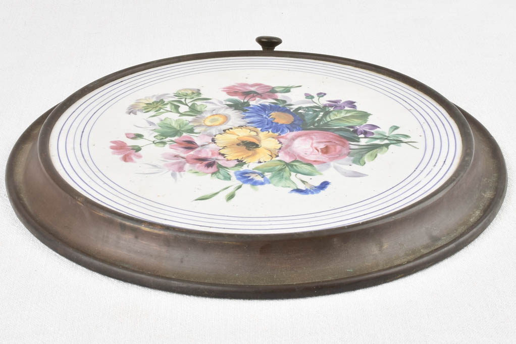 Antique brass wood stove lid