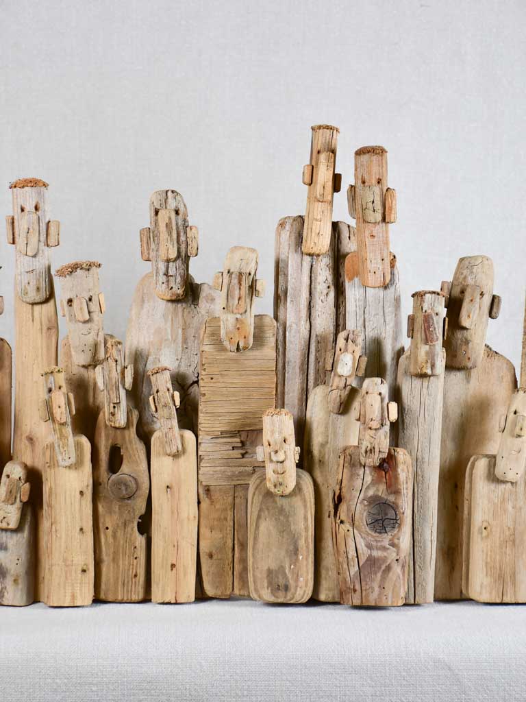 Panoramic driftwood sculpture by JP Dreano - 31 characters 28¾"