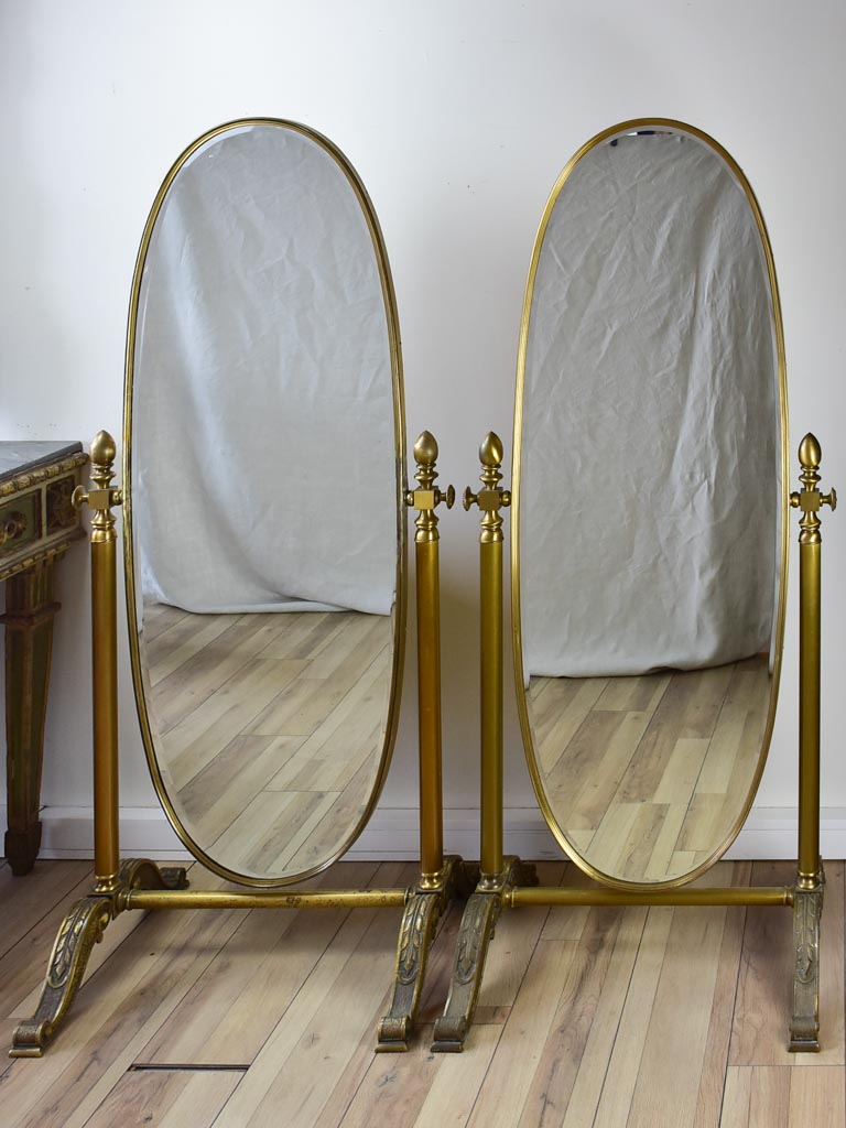 Pair of adjustable oval Italian mirrors from a boutique 61"