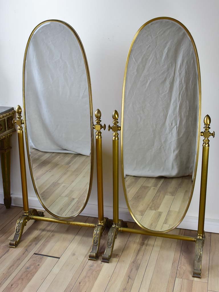 Pair of adjustable oval Italian mirrors from a boutique 61"