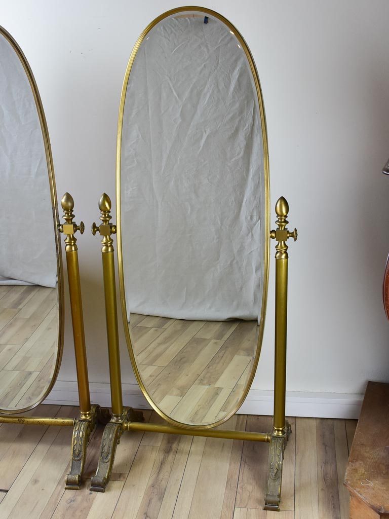 Pair of adjustable oval Italian mirrors from a boutique 61"