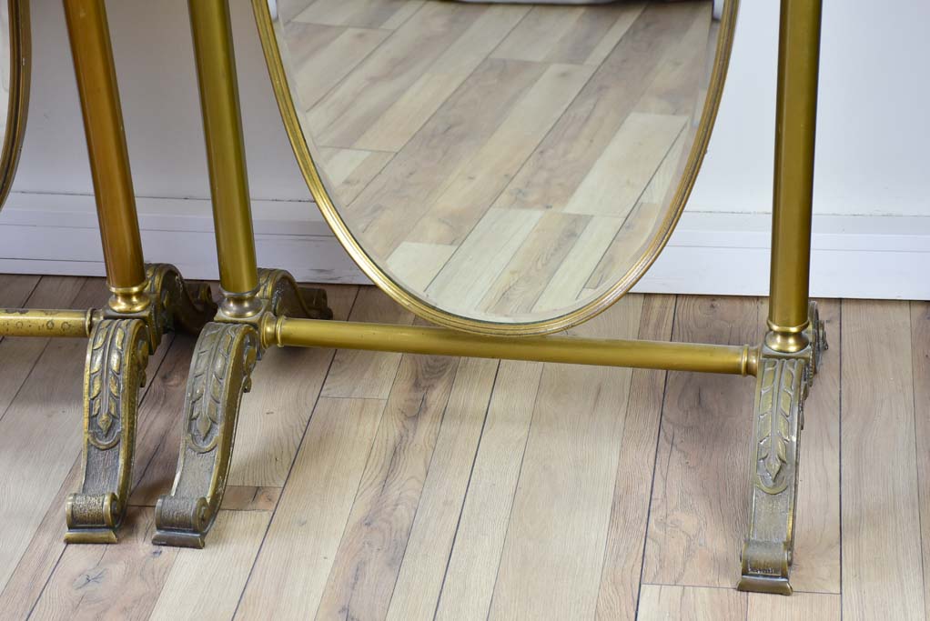 Pair of adjustable oval Italian mirrors from a boutique 61"