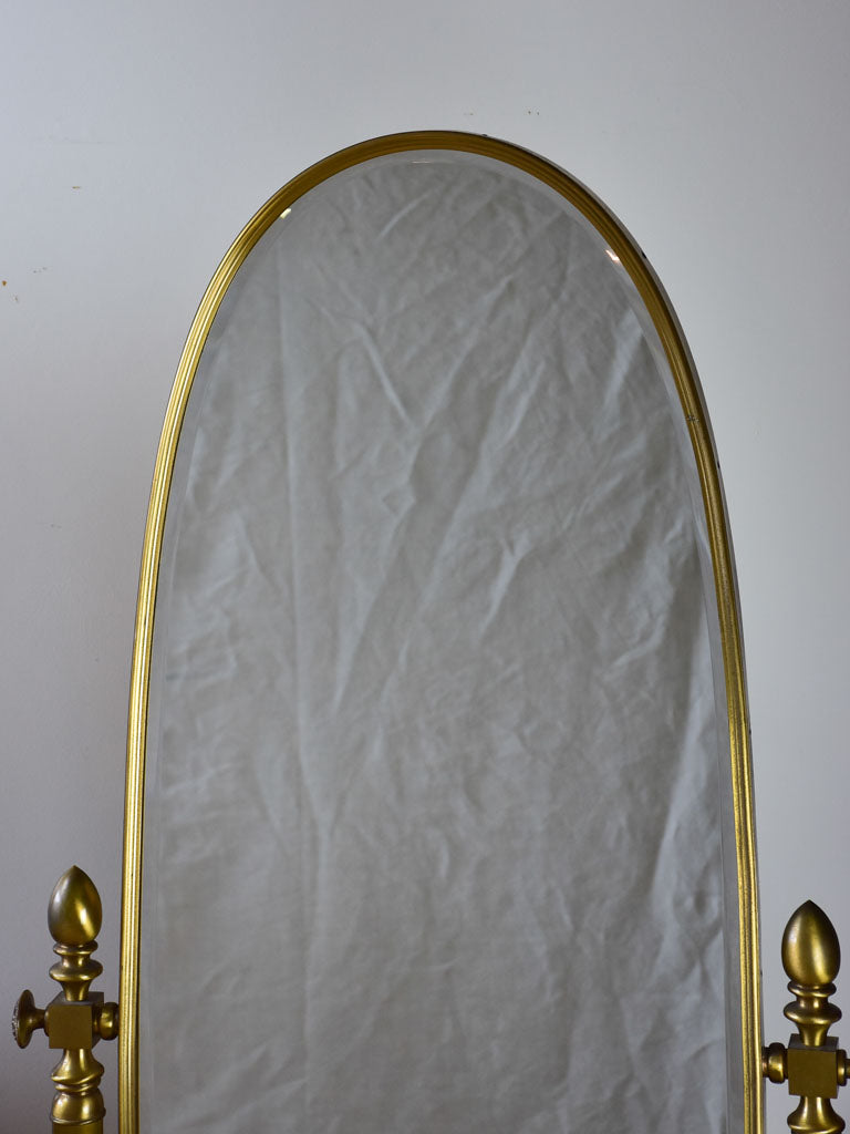 Pair of adjustable oval Italian mirrors from a boutique 61"