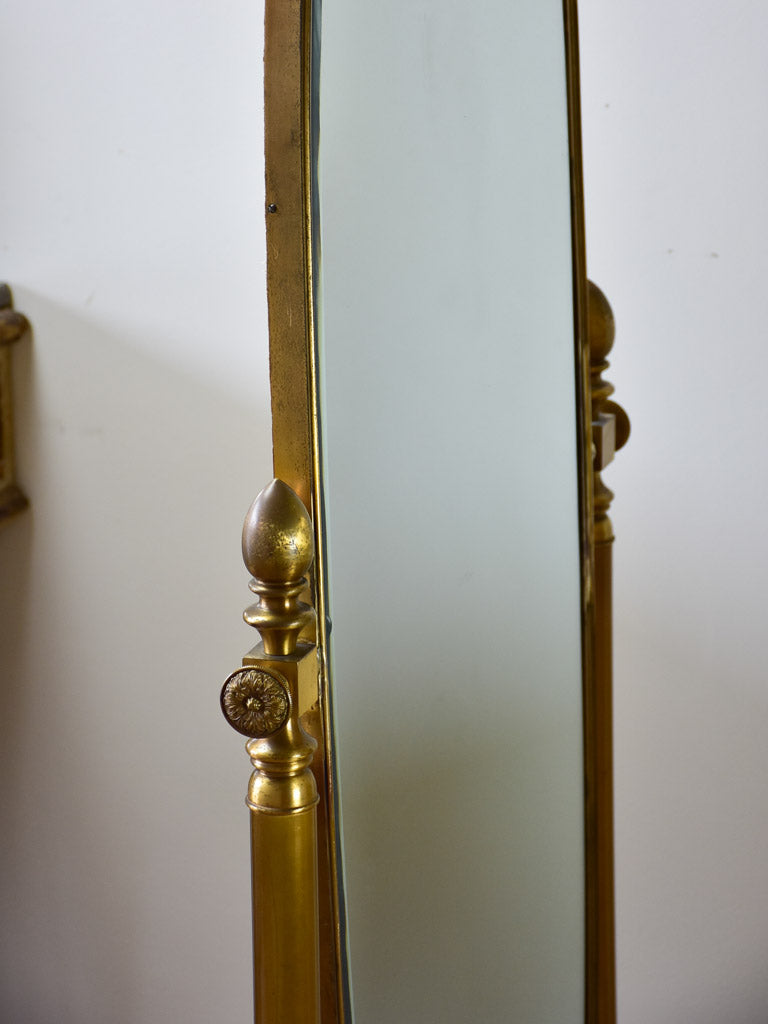 Pair of adjustable oval Italian mirrors from a boutique 61"