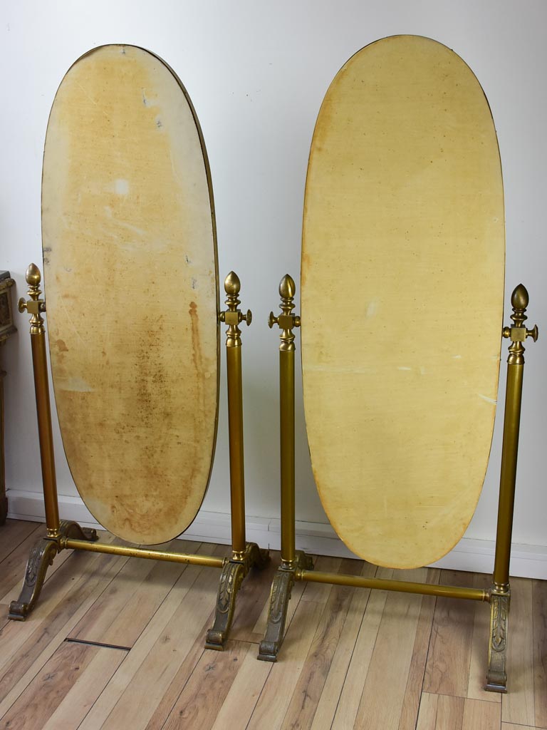 Pair of adjustable oval Italian mirrors from a boutique 61"