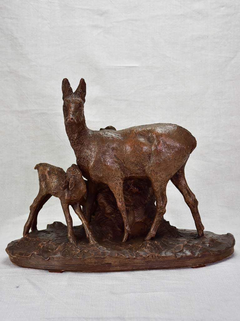 Early 20th Century clay sculpture of a deer and faun 13¾"