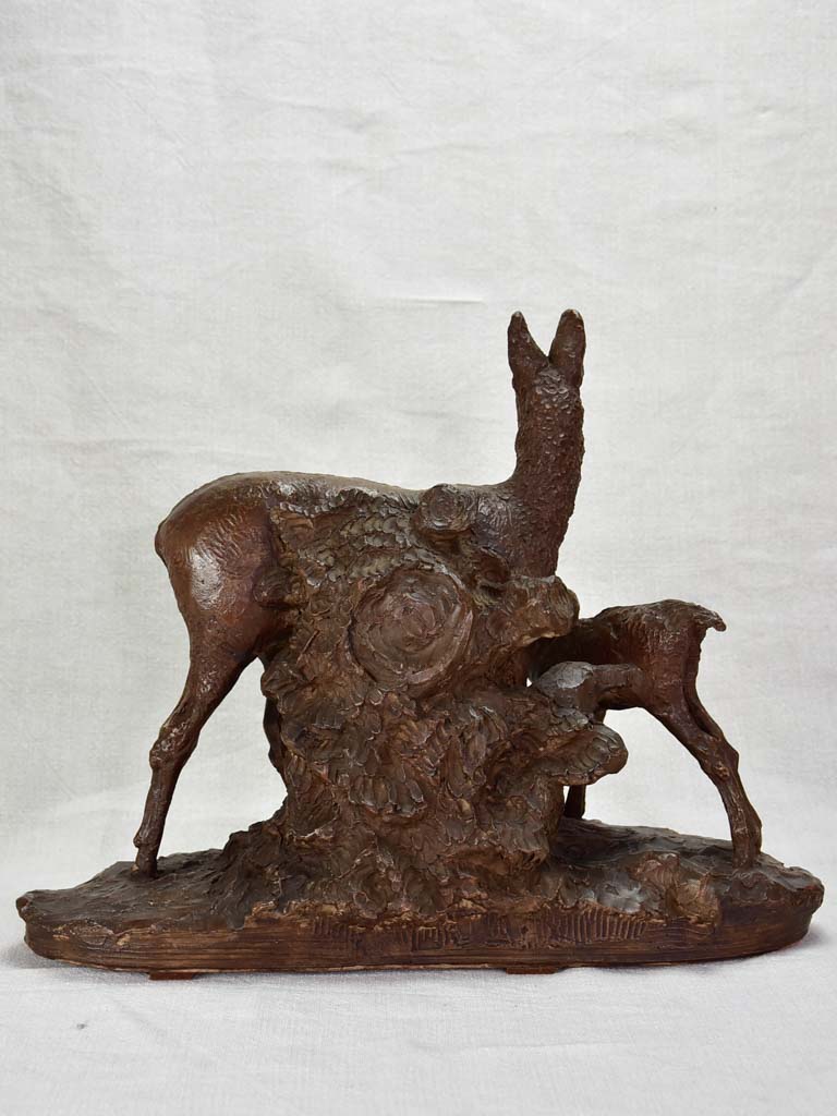 Early 20th Century clay sculpture of a deer and faun 13¾"