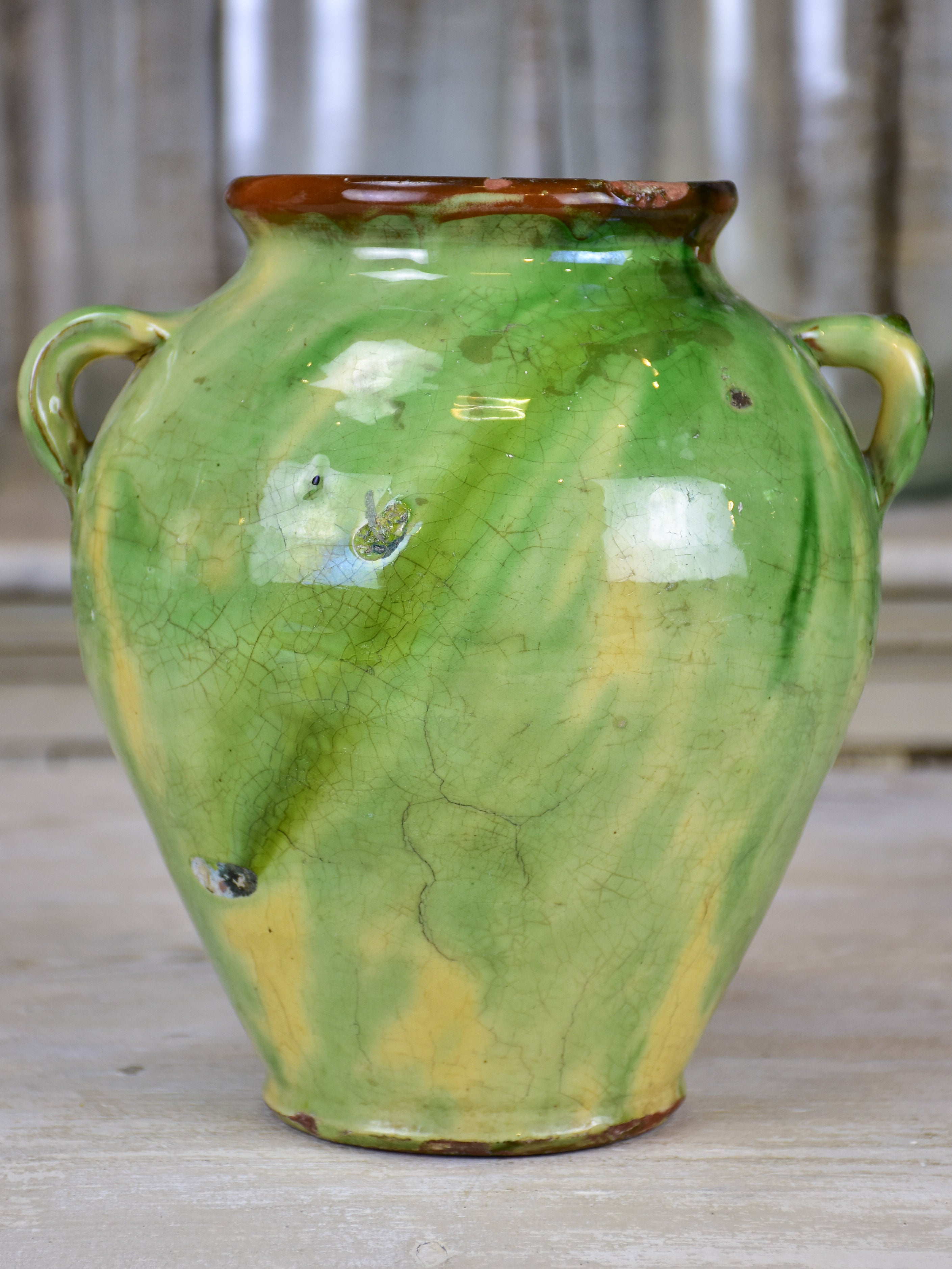 Antique confit pot with yellow and green glaze