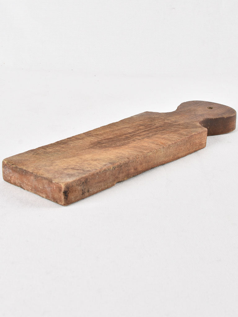 Unique cutting board with puzzle handle