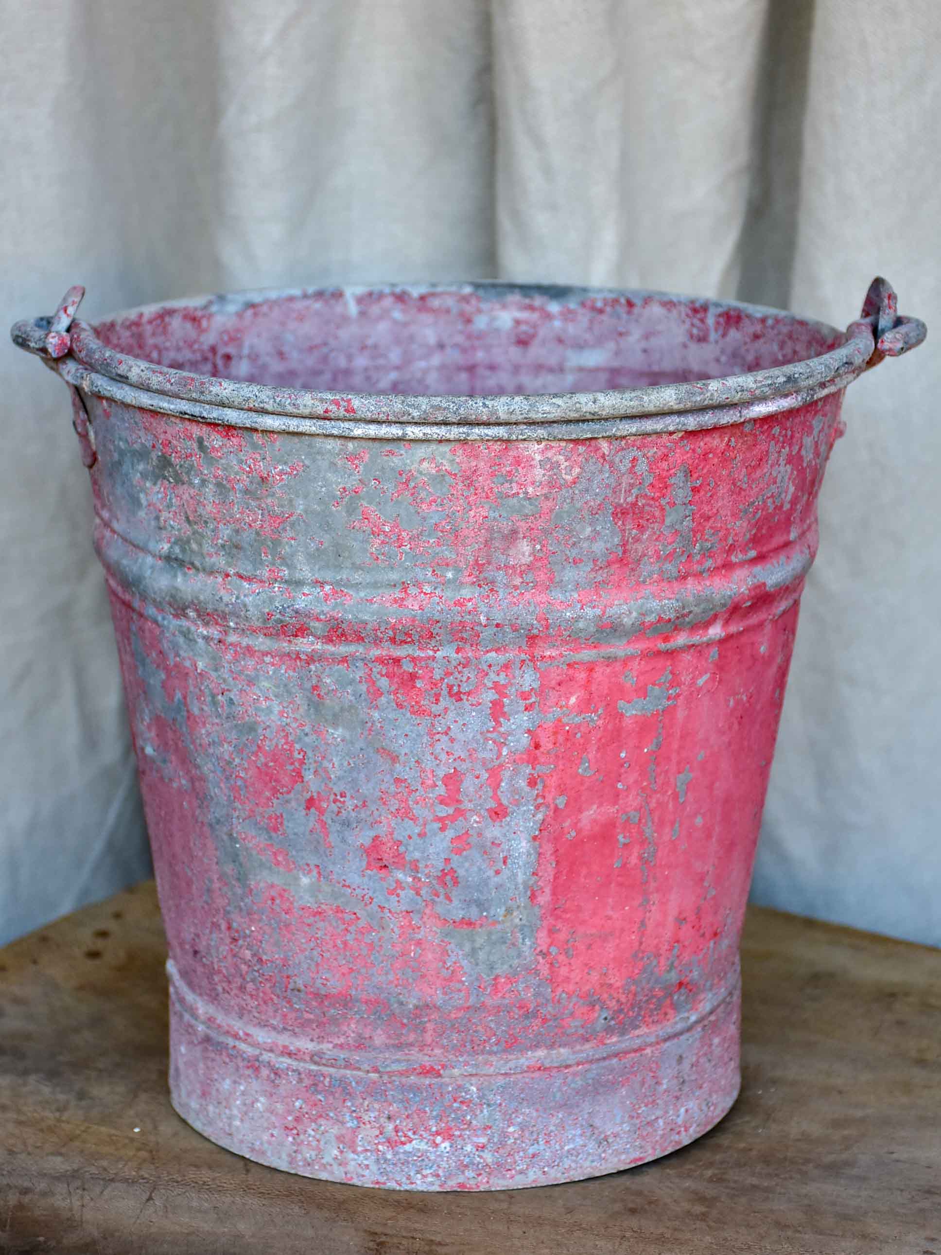 Antique French zinc bucket with red / pink patina