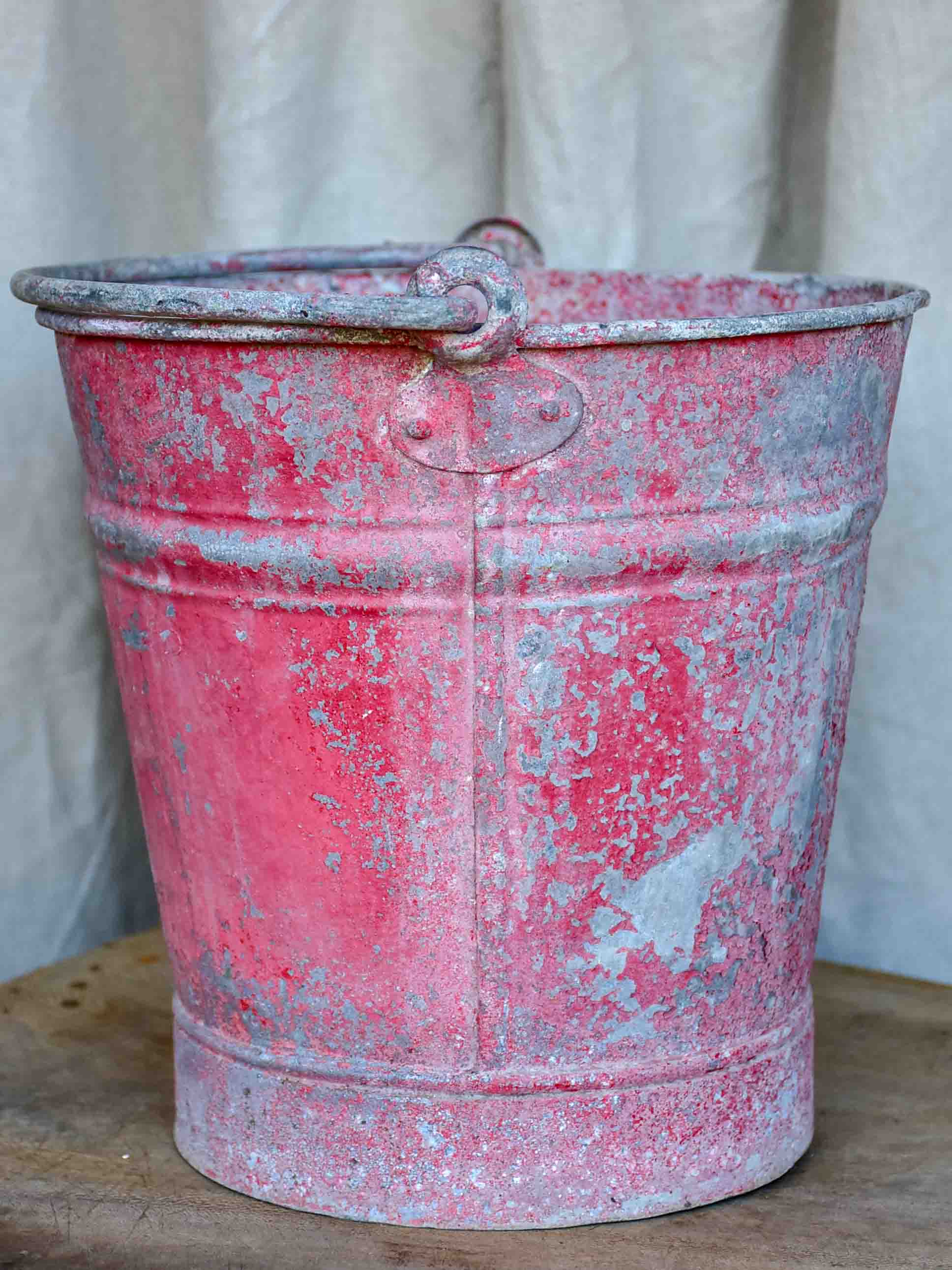 Antique French zinc bucket with red / pink patina
