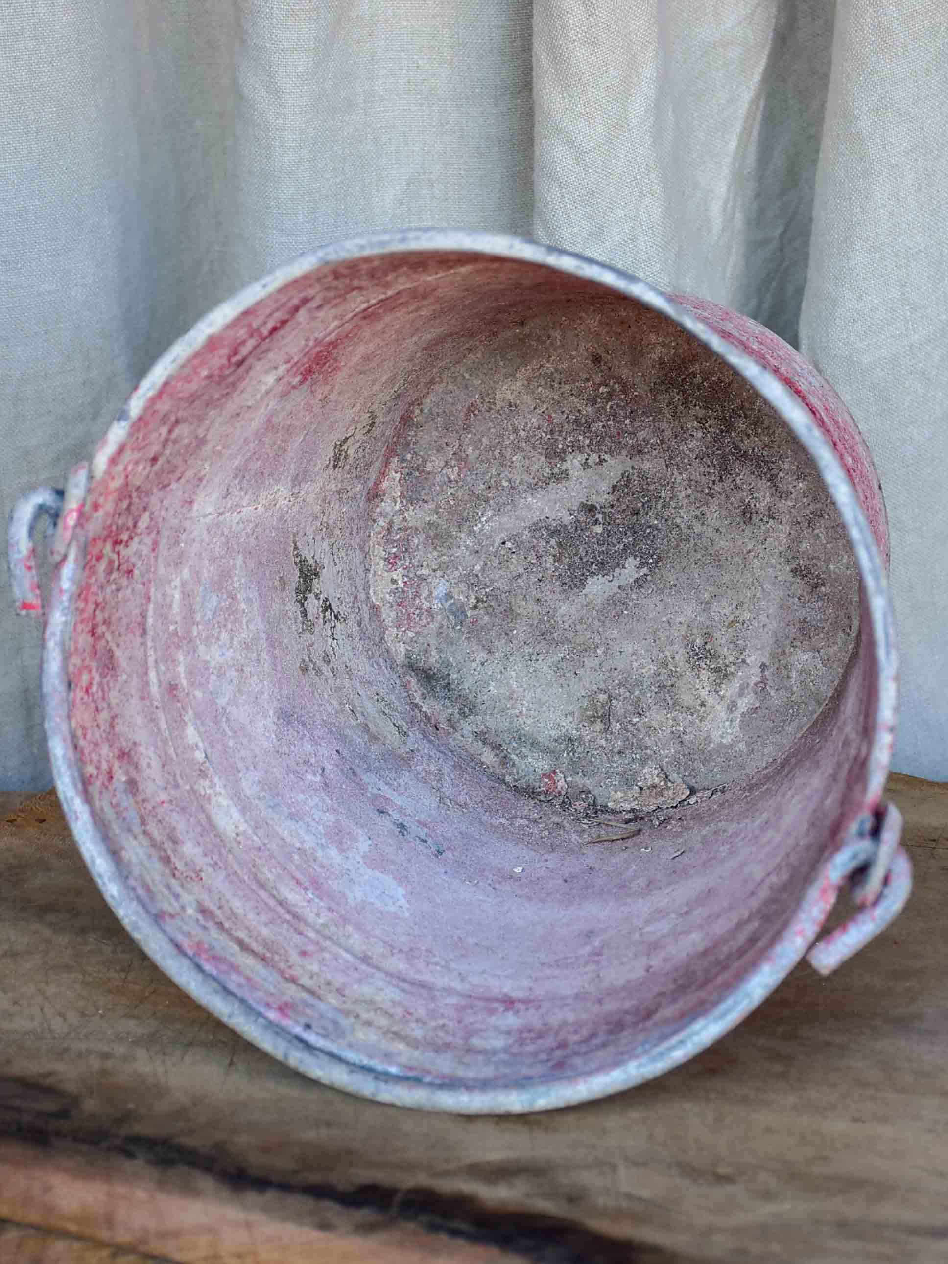 Antique French zinc bucket with red / pink patina