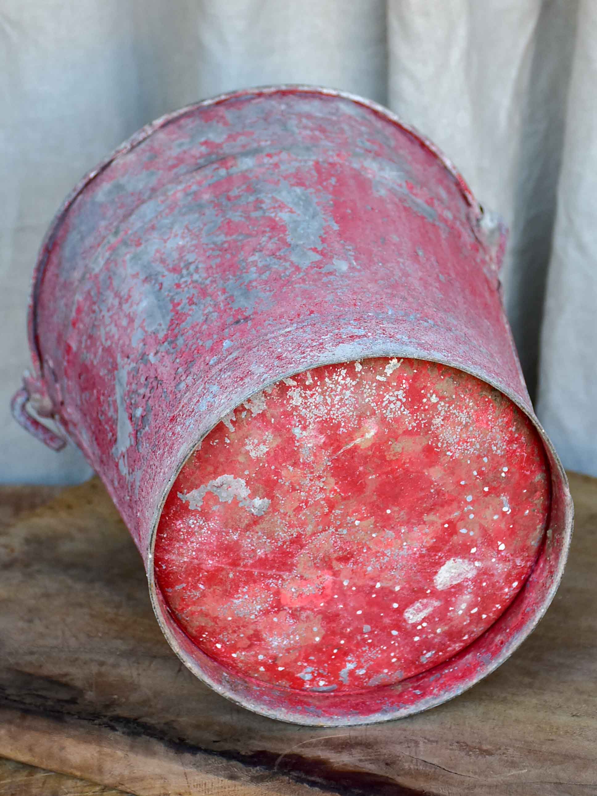 Antique French zinc bucket with red / pink patina