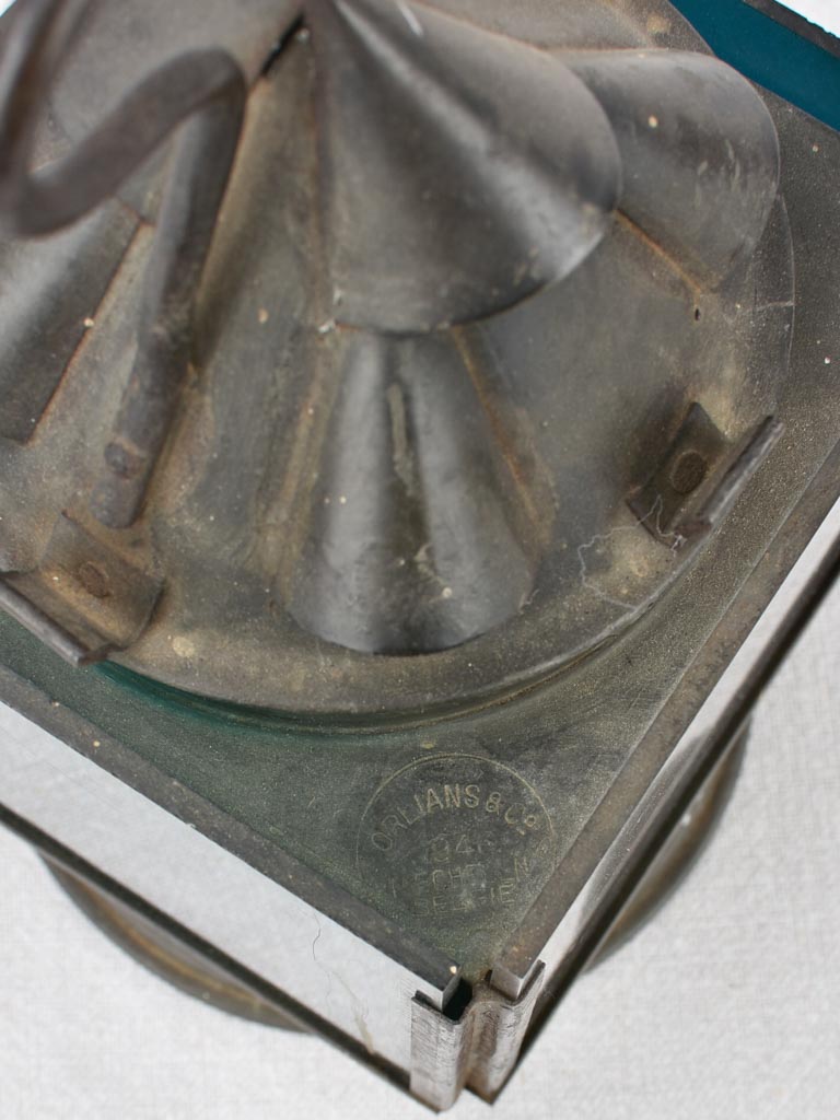 Old railway lantern in tole