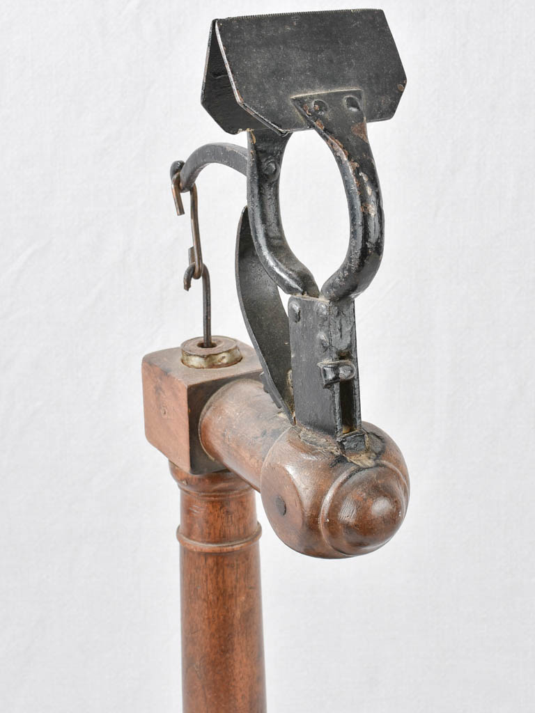 Historic foot-lever glove stand