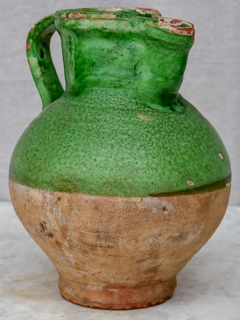 Antique French pitcher with matte green glaze