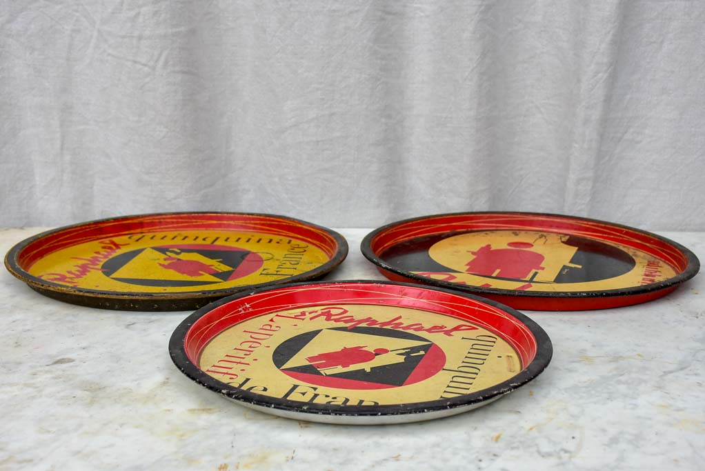 Collection of four round bistro trays - Quinquina