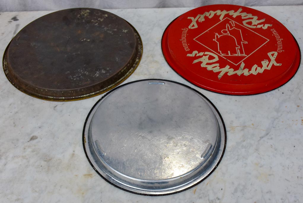 Collection of four round bistro trays - Quinquina