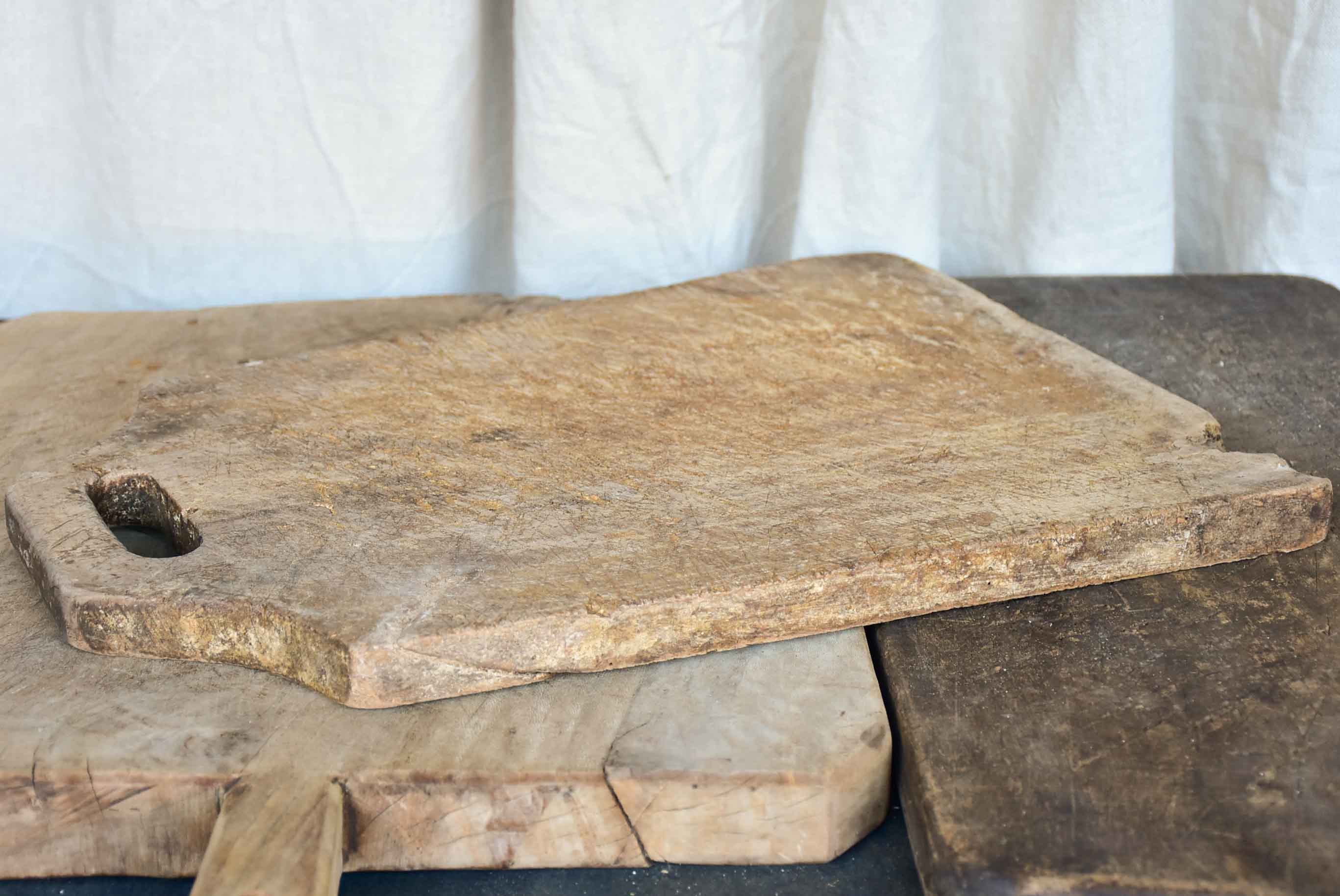 Flat and tapered antique French cutting board