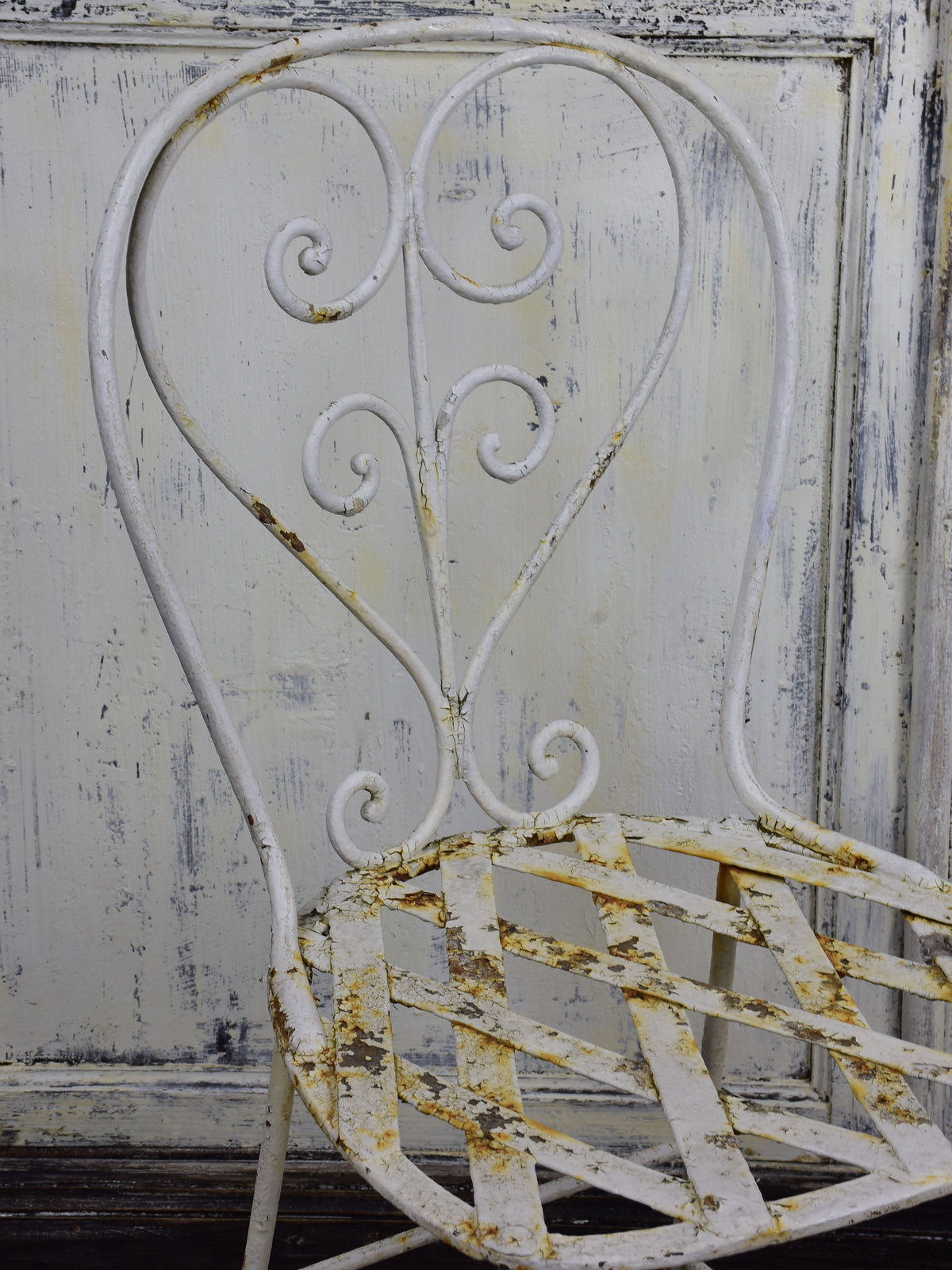 Four antique French garden chairs